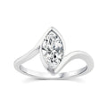 A silver-tone ring featuring a marquise-cut clear gemstone in a curved, wave-like setting on a plain white background.