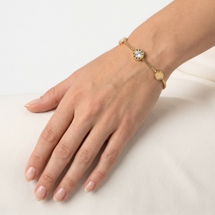 3 Sliders Gold Bracelet worn on wrist - DKNY