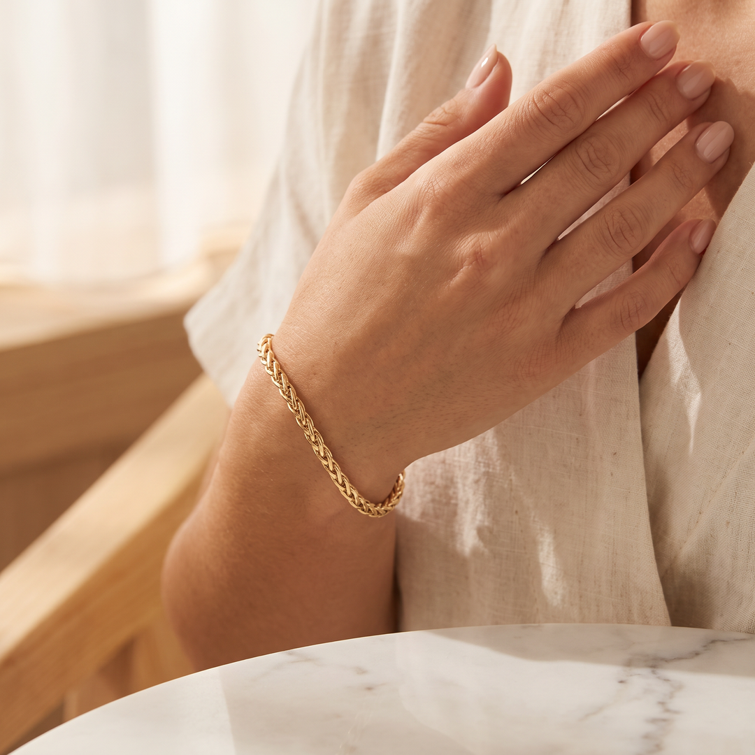 9K Yellow Gold Wheat Link Bracelet worn on wrist