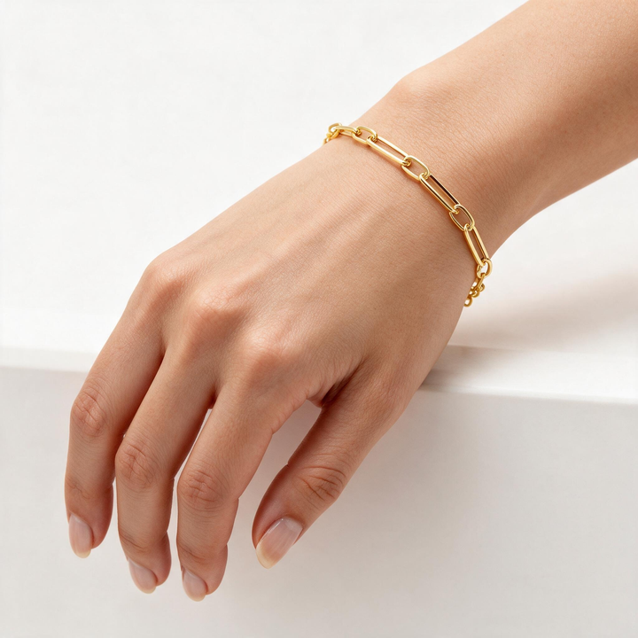 9K Yellow Gold Long Open Link Station Bracelet worn on wrist, clasp at back