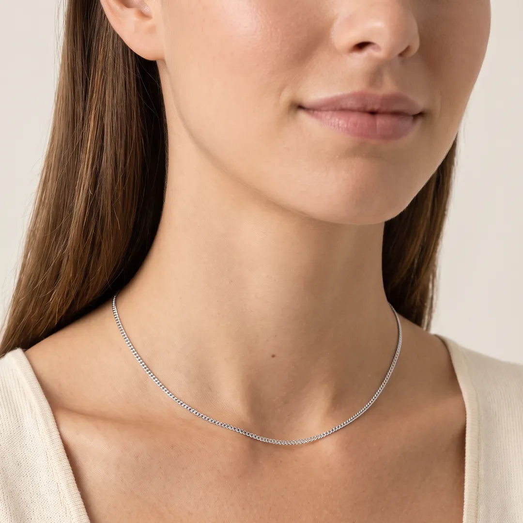 18K White Gold Solid Diamond Cut Curb Chain worn on the neck | The Jewellery Boutique