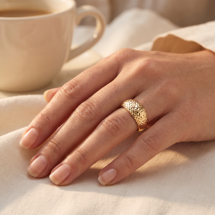 9K Yellow Gold Diamond Cut Dome Ring worn on hand, lifestyle shot