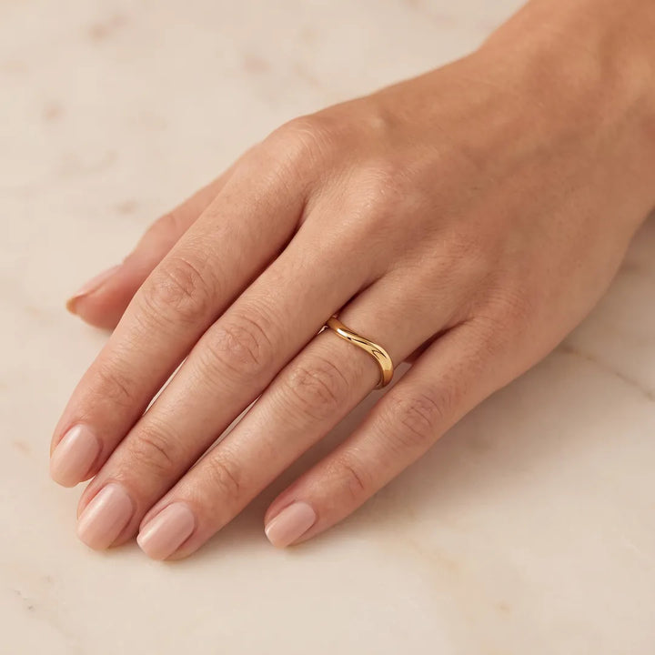 9K Yellow Gold Solid Curved Ring worn on-model | The Jewellery Boutique