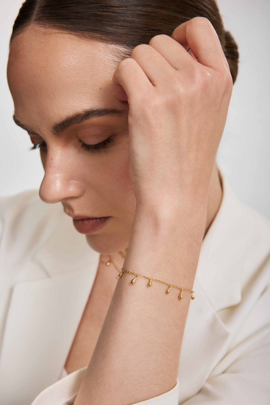 Gold Polished Teardrop Dangle Station Bracelet