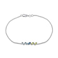 0.04ct Diamond, Topaz & Peridot Bracelet in 9K White Gold
