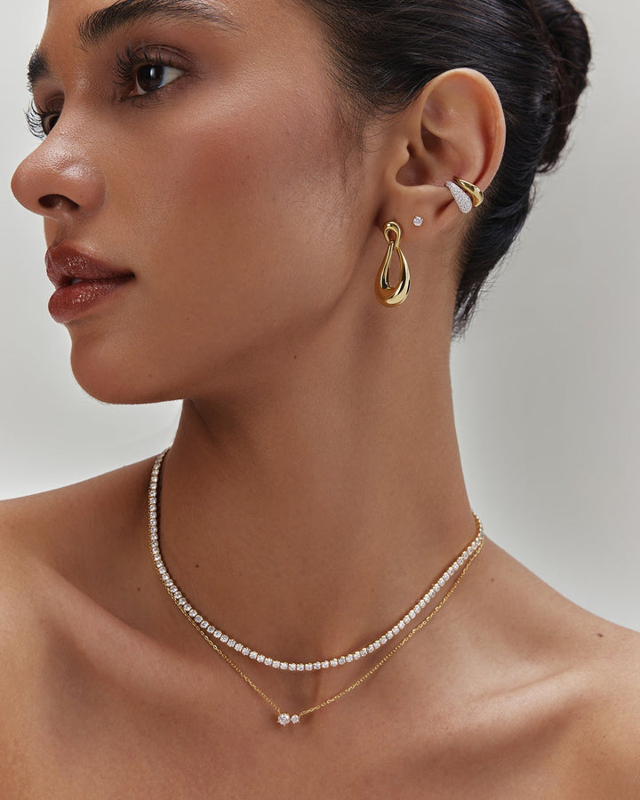 Gold Interlocked Wave Stud Hoop Earrings