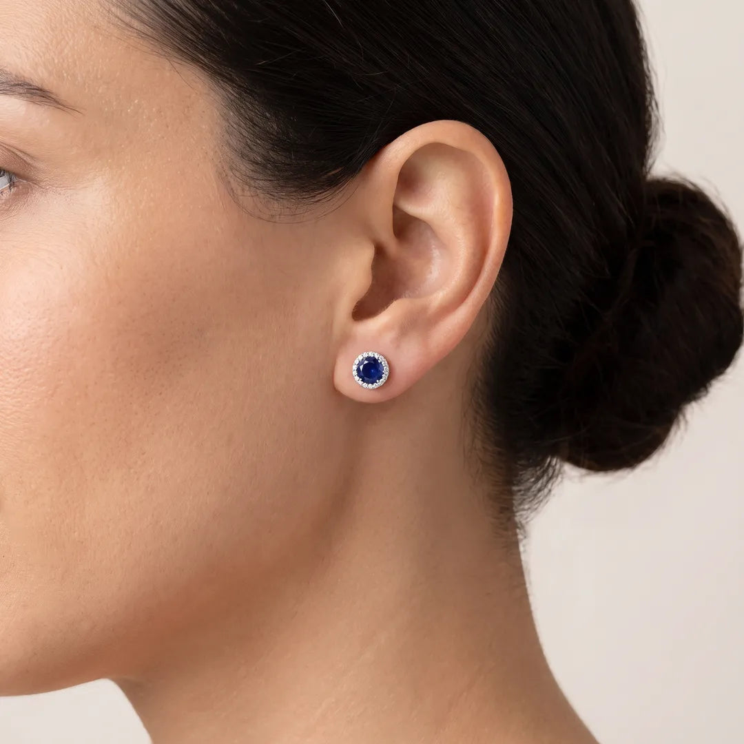 Sapphire Earrings with 0.05ct Diamonds in 9K White Gold worn on model's ear - IGE-13111BS-W
