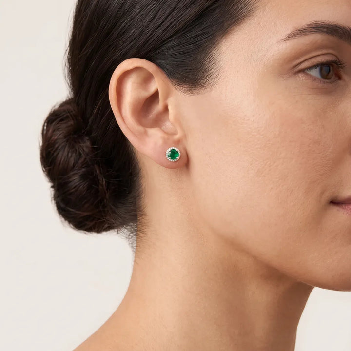 Emerald Earrings with 0.05ct Diamonds in 9K Yellow Gold worn on model's ear - IGE-13111EM-Y