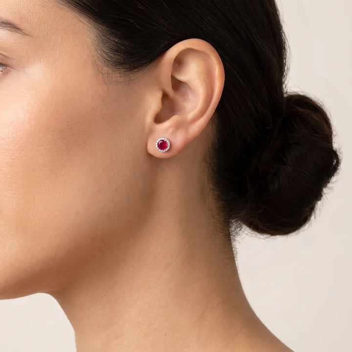 Ruby Earrings with 0.05ct Diamonds in 9K Yellow Gold worn on model's ear - IGE-13111RB-Y