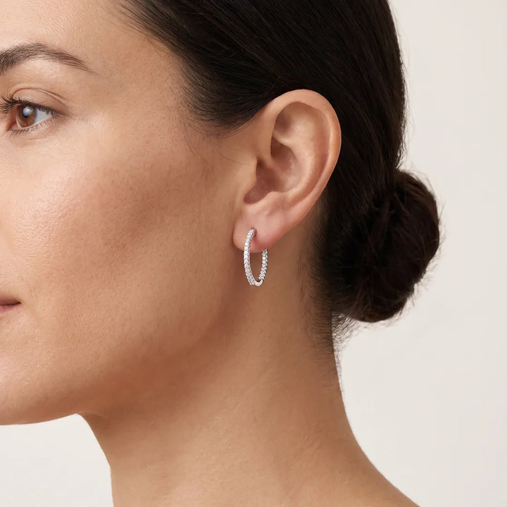 Inside Out Hoops with 0.25ct Diamonds in 9K White Gold worn on model's ear - IGE-13251-025-W