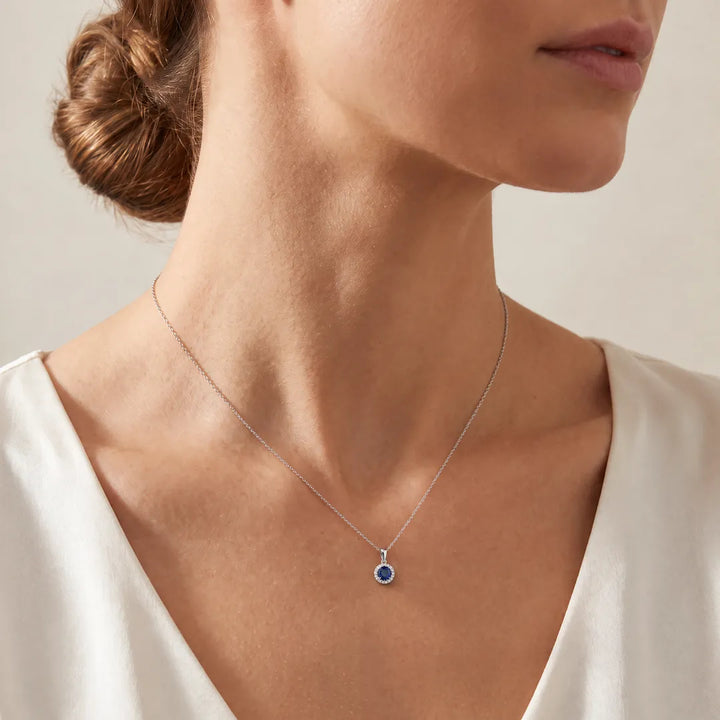 Sapphire Pendant with 0.03ct Diamonds in 9K White Gold worn on a fine white gold chain