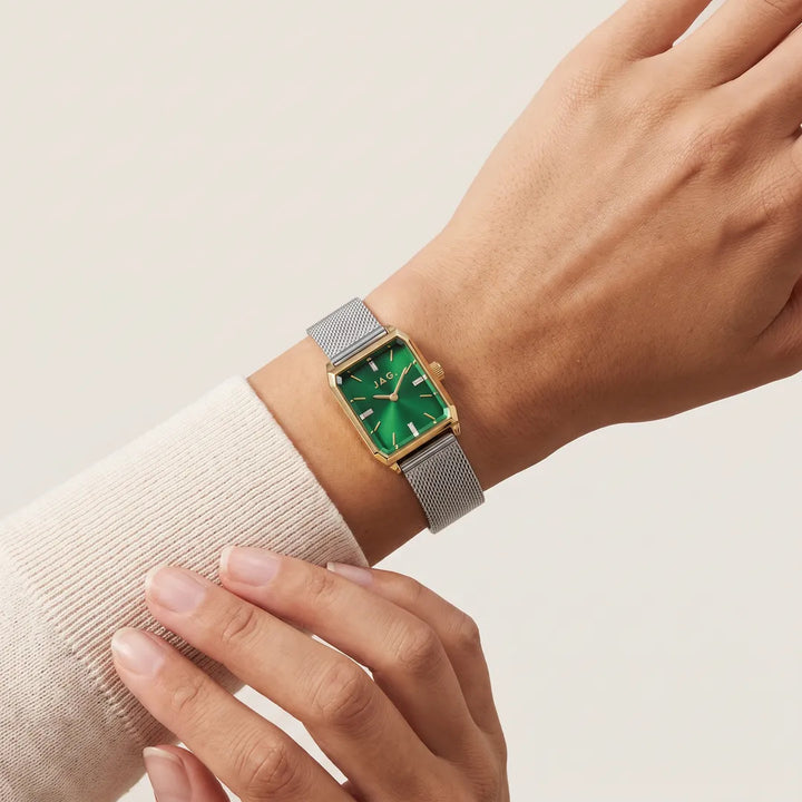 Jag Sorrento womens 24mm green dial gold case watch with silver mesh strap worn on wrist