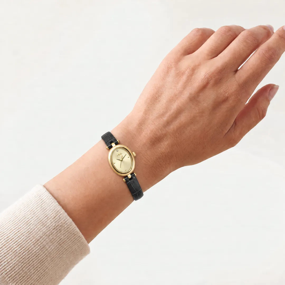 Jag Emilie womens gold dial 20.5mm black leather strap watch worn on wrist