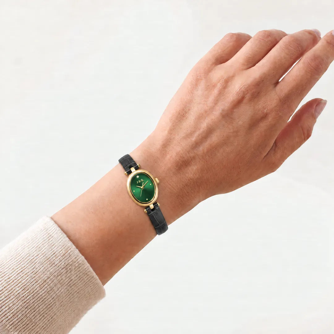 Jag Emilie womens green dial 20.5mm black leather strap watch worn on wrist