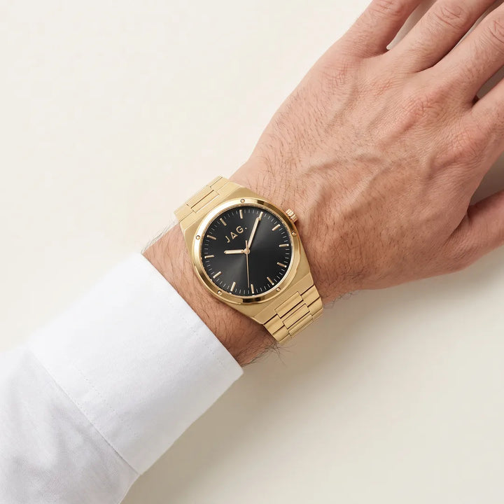 Jag Arlo Mens Black Dial 41mm Gold Watch on wrist, top-down view
