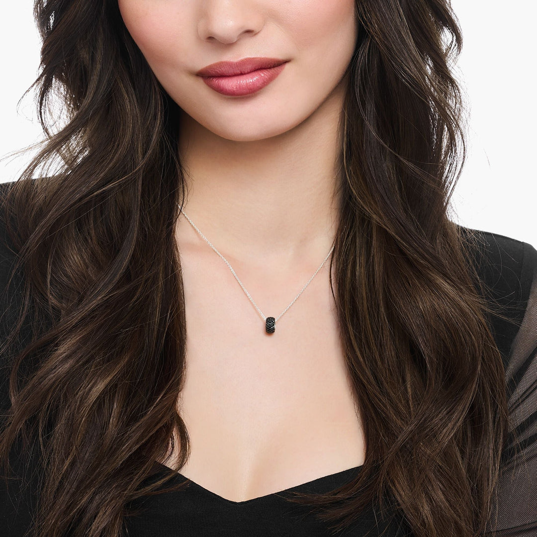 Necklace with ring pendant and black zirconia