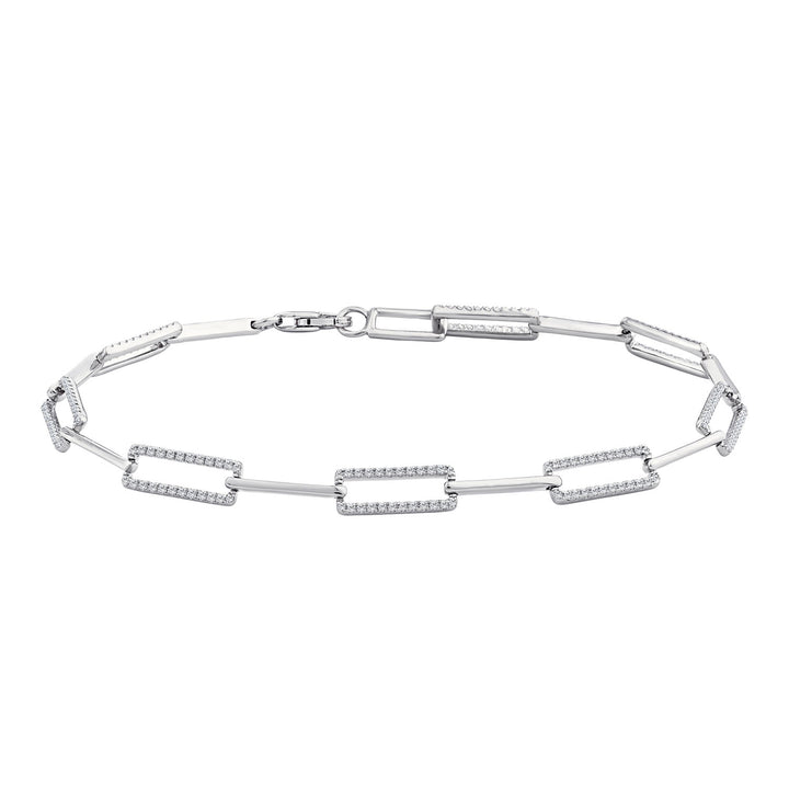 Silver bracelet with diamond accents on a white background