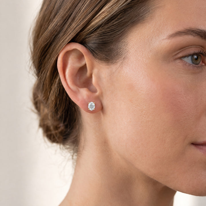 1.00ct Lab Grown Diamond Earrings in 9K Yellow Gold worn on model