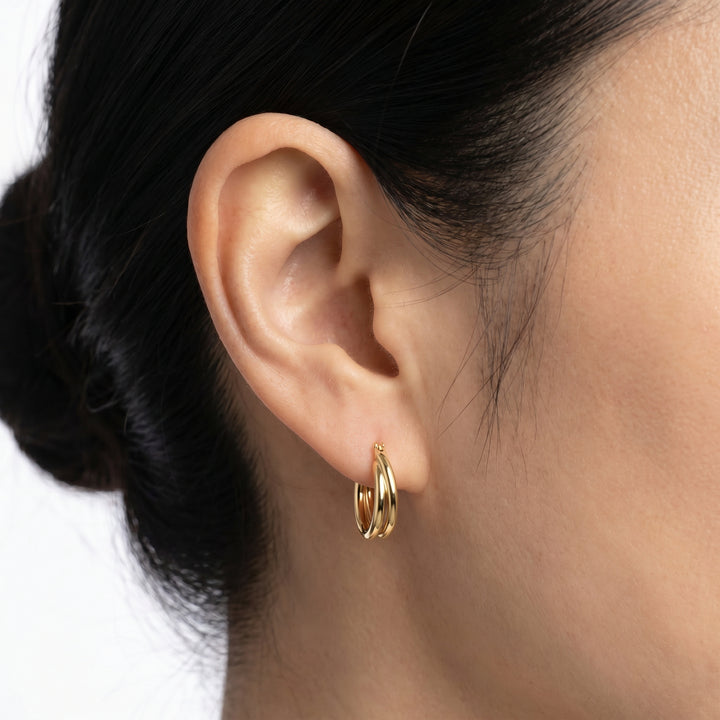22K Gold Vermeil 16mm Double-Tube Crossover Hoop Earrings worn by model