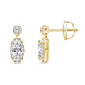 A pair of yellow gold drop earrings with marquise-cut clear gemstones, shown from the front and side angles on a plain white background.