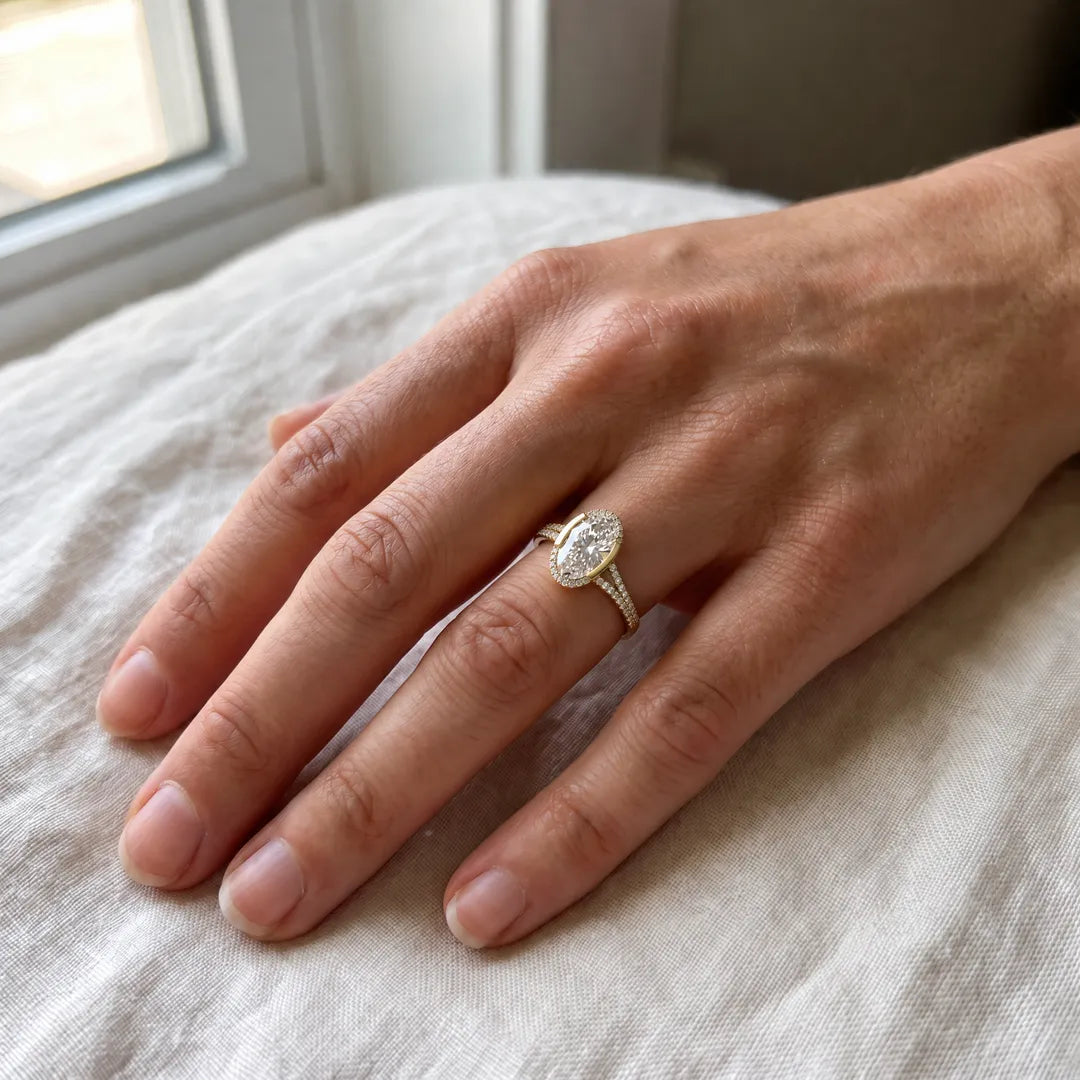 4.30ct Elongated Oval Lab Grown Diamond Ring in 18K Yellow Gold worn on hand | The Jewellery Boutique