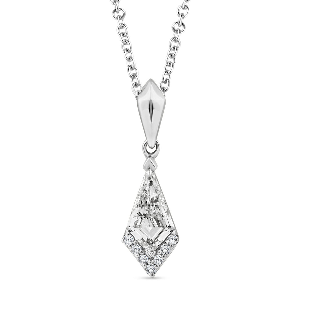 A silver pendant necklace featuring a clear, faceted diamond-cut gemstone surrounded by small accent stones, suspended from a silver chain on a plain white background.