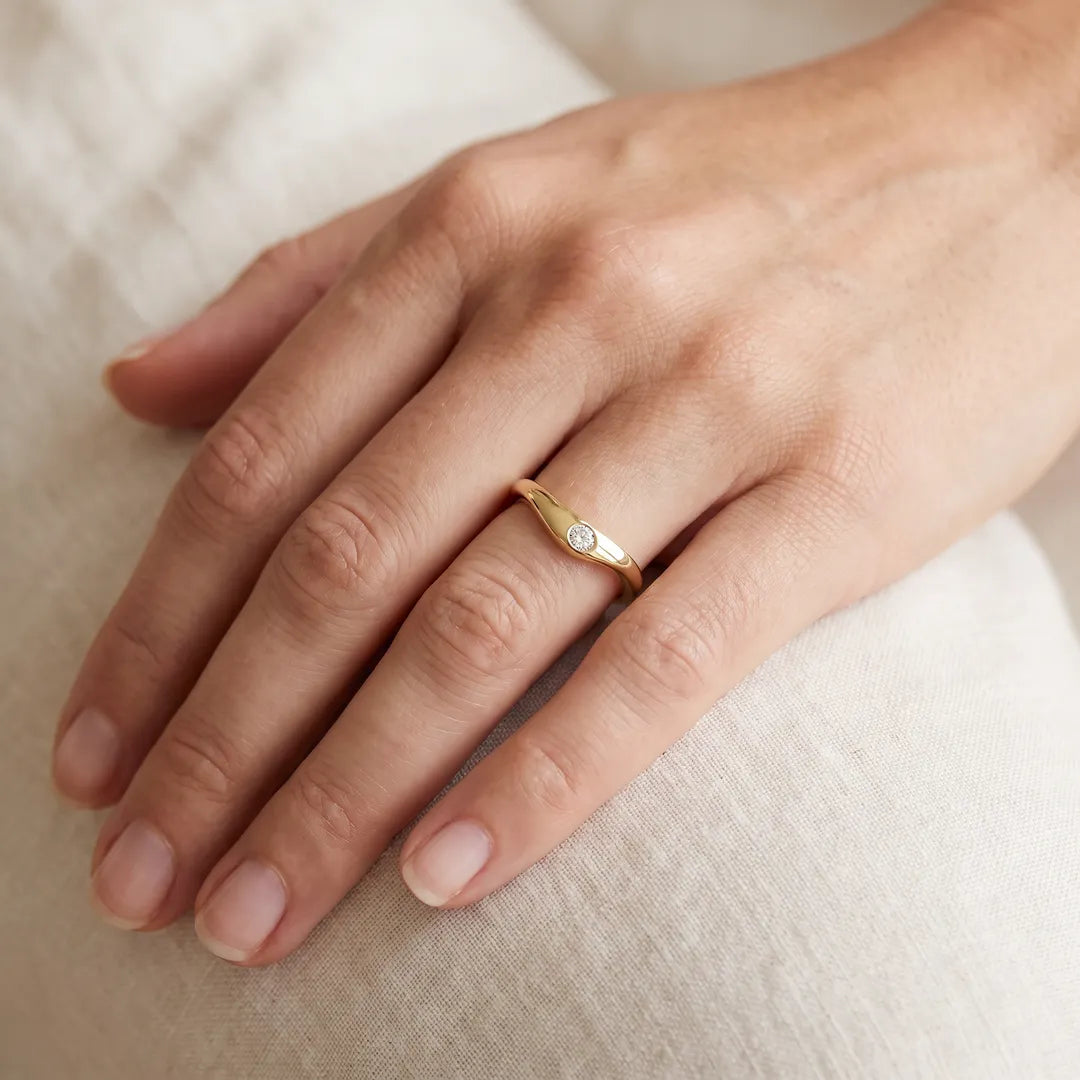 0.15ct Lab Grown Diamond Ring in 9K Yellow Gold worn on model's hand