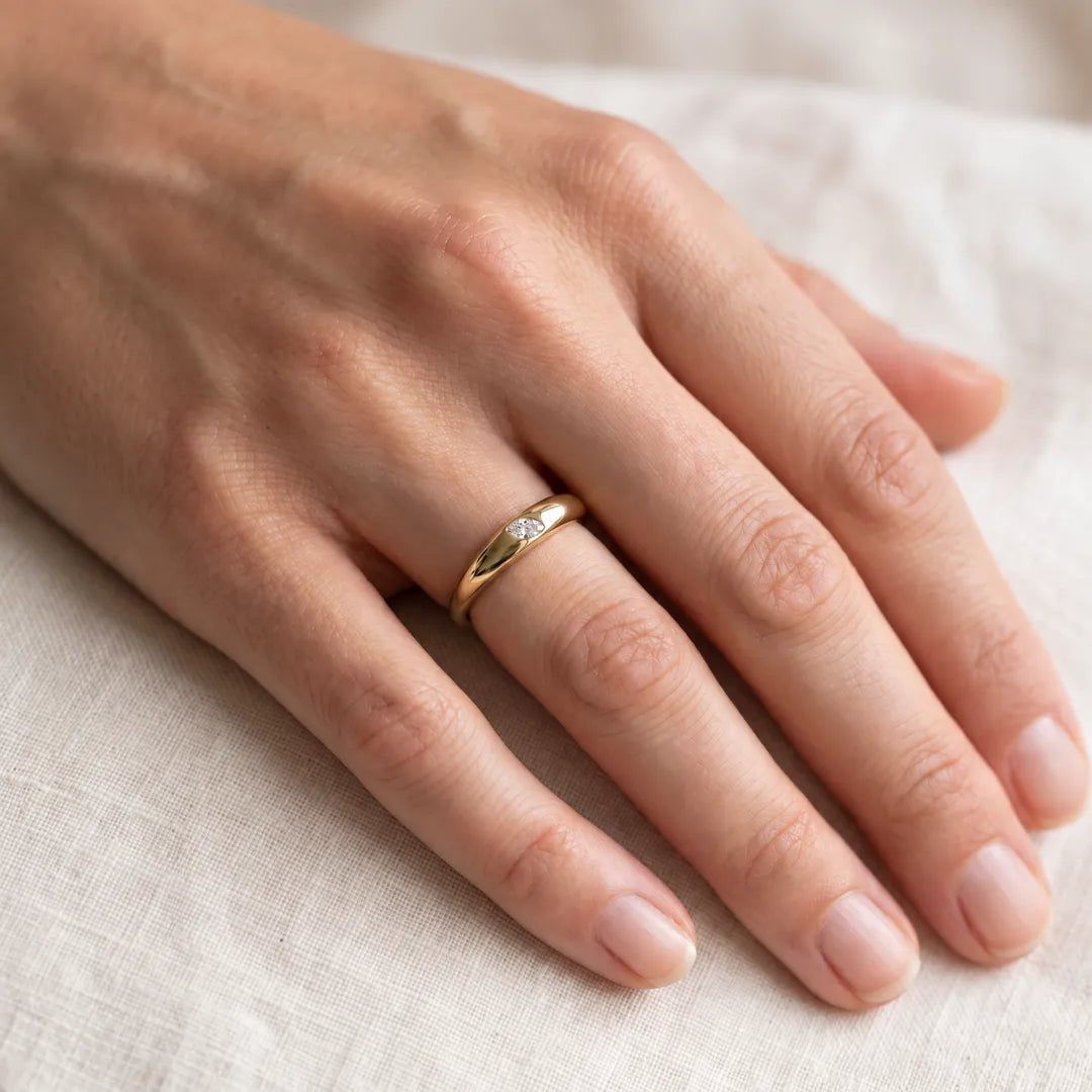 0.10ct Lab Grown Diamond Ring in 9K Yellow Gold worn on model's hand