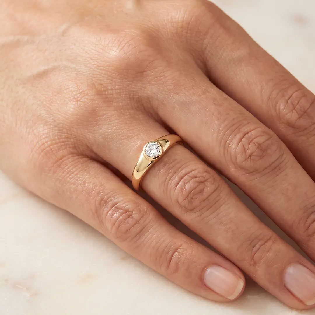 0.25ct Lab Grown Diamond Ring in 9K Yellow Gold worn on a model's ring finger