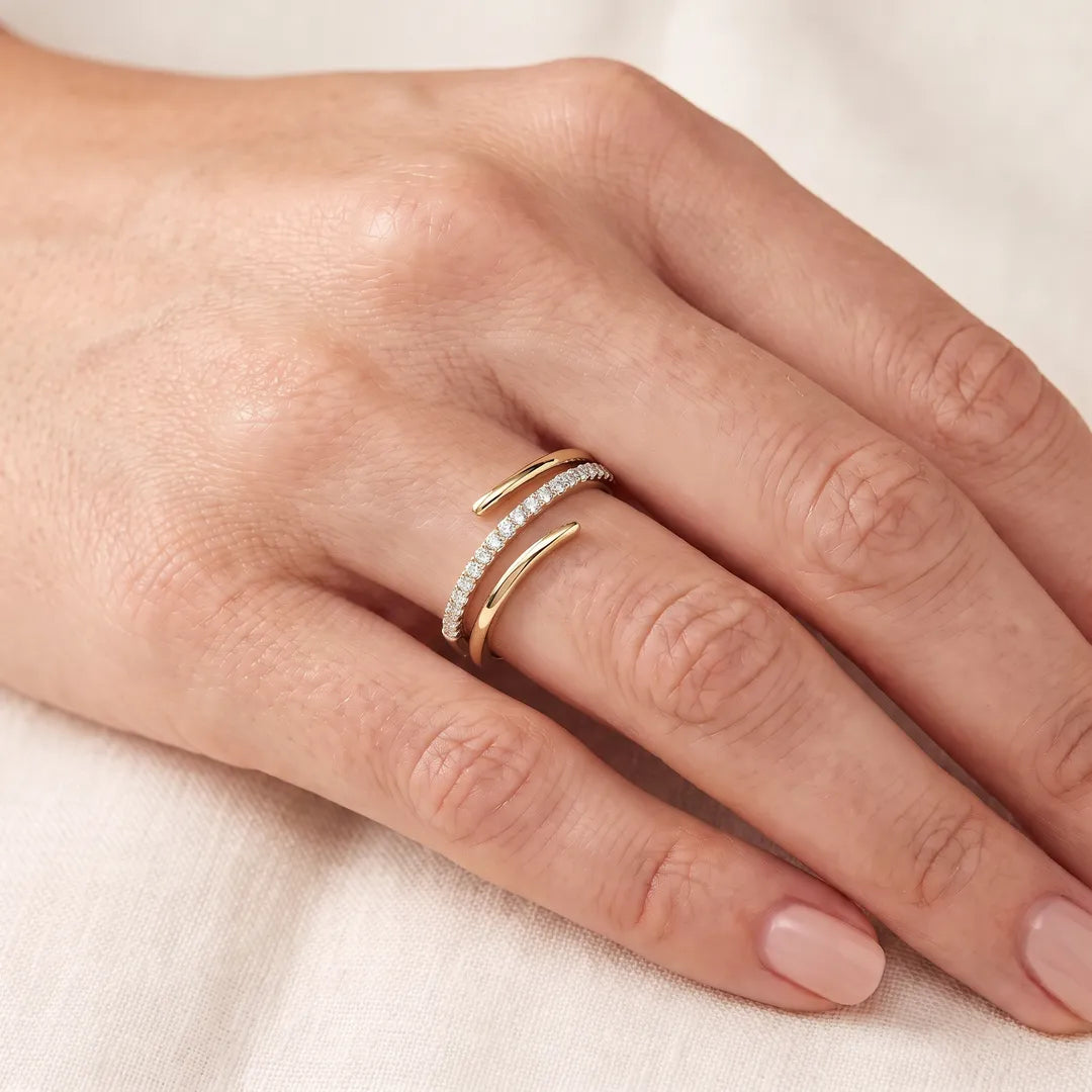 0.18ct Lab Grown Diamond Wrap Ring in 9K Yellow Gold worn on model's hand