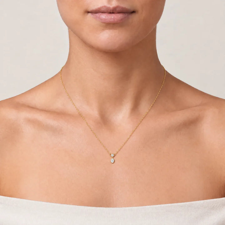 0.25ct Lab Grown Diamond Necklace in 9K Yellow Gold worn on model