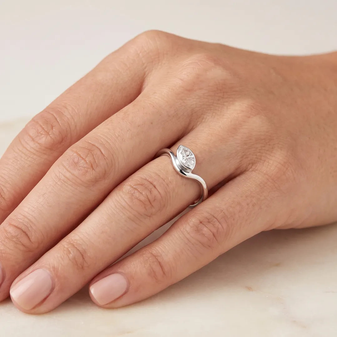 0.50ct Marquise Lab Grown Diamond Offset Ring in 9K White Gold worn on hand