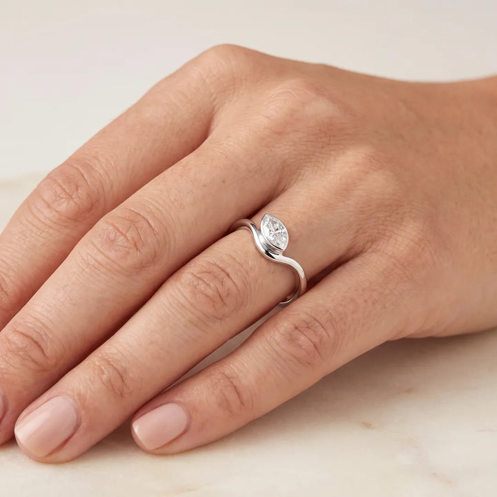 0.50ct Marquise Lab Grown Diamond Offset Ring in 9K White Gold worn on hand