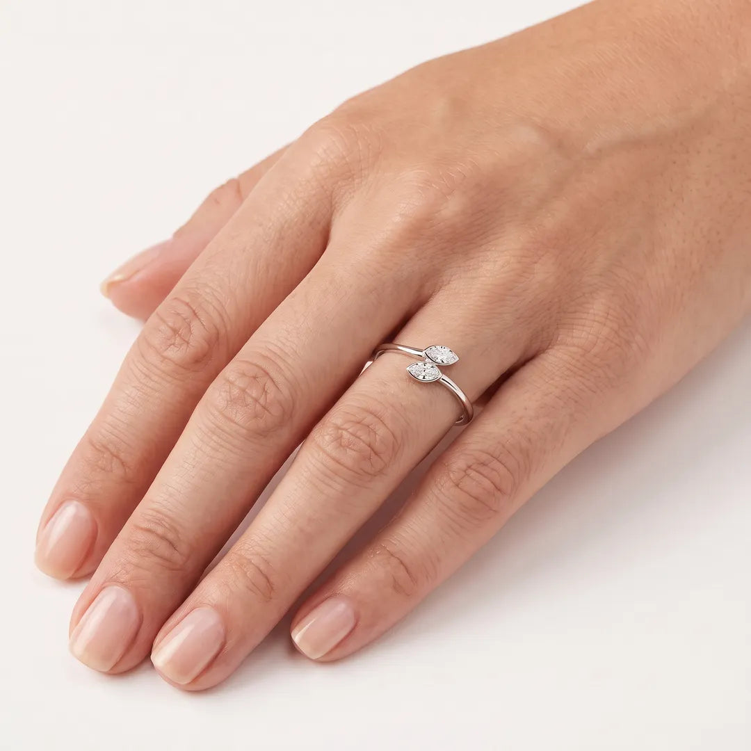 0.50ct marquise lab grown diamond open ring in 9K white gold, worn on a model's ring finger