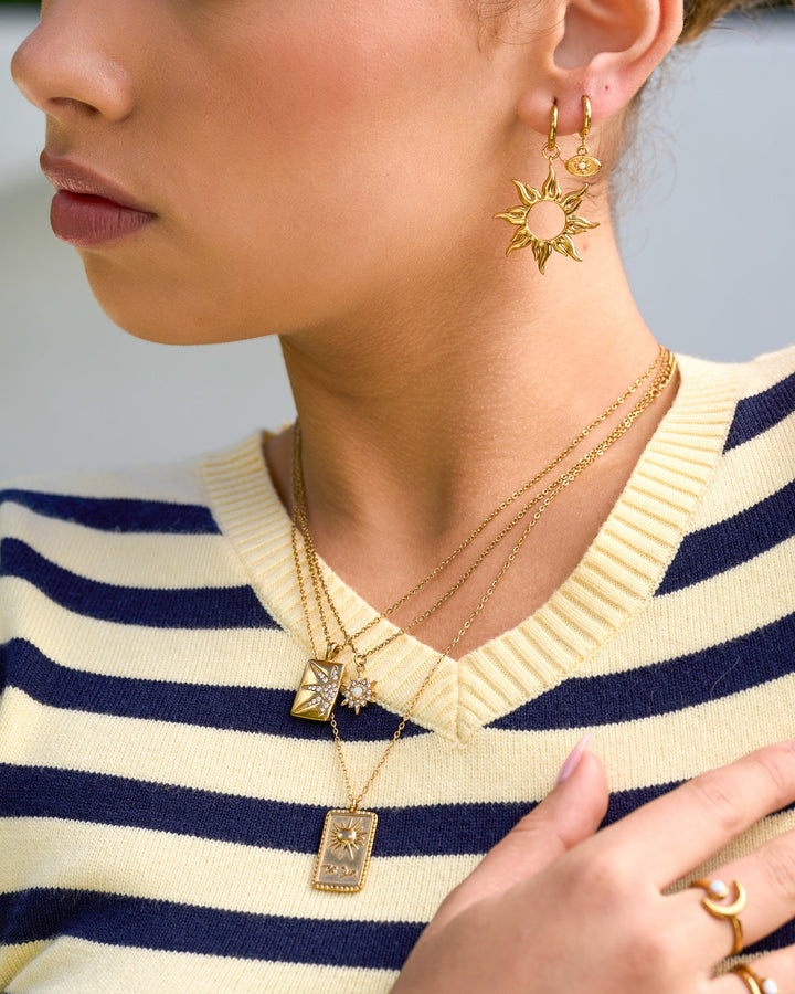 Solara Sunshine Drop Earrings styled on a model, close-up detail — Zoe Olivia