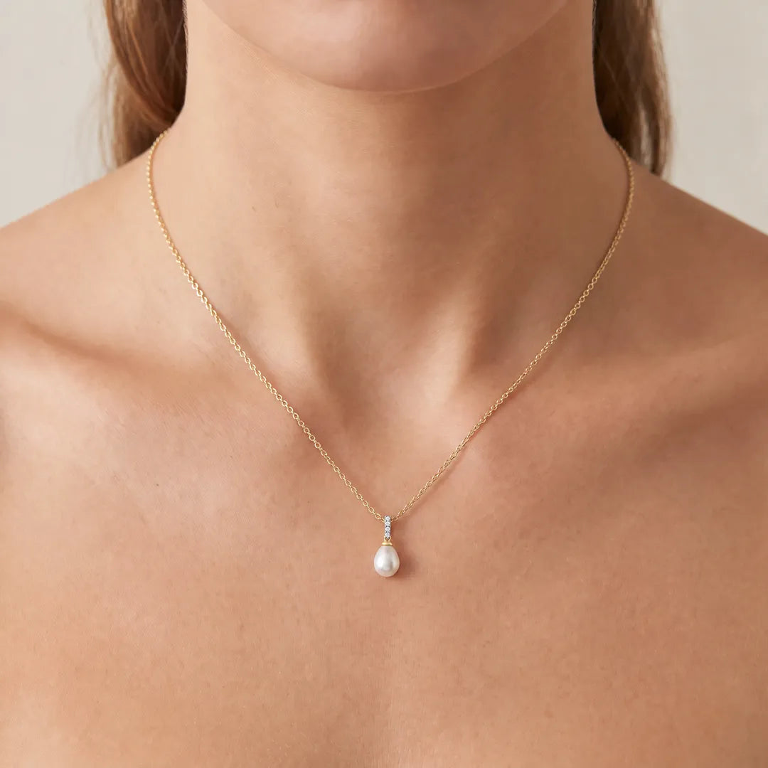 Diamond Pearl Necklace with 0.02ct Diamonds in 9K Yellow Gold, teardrop pearl pendant worn on model