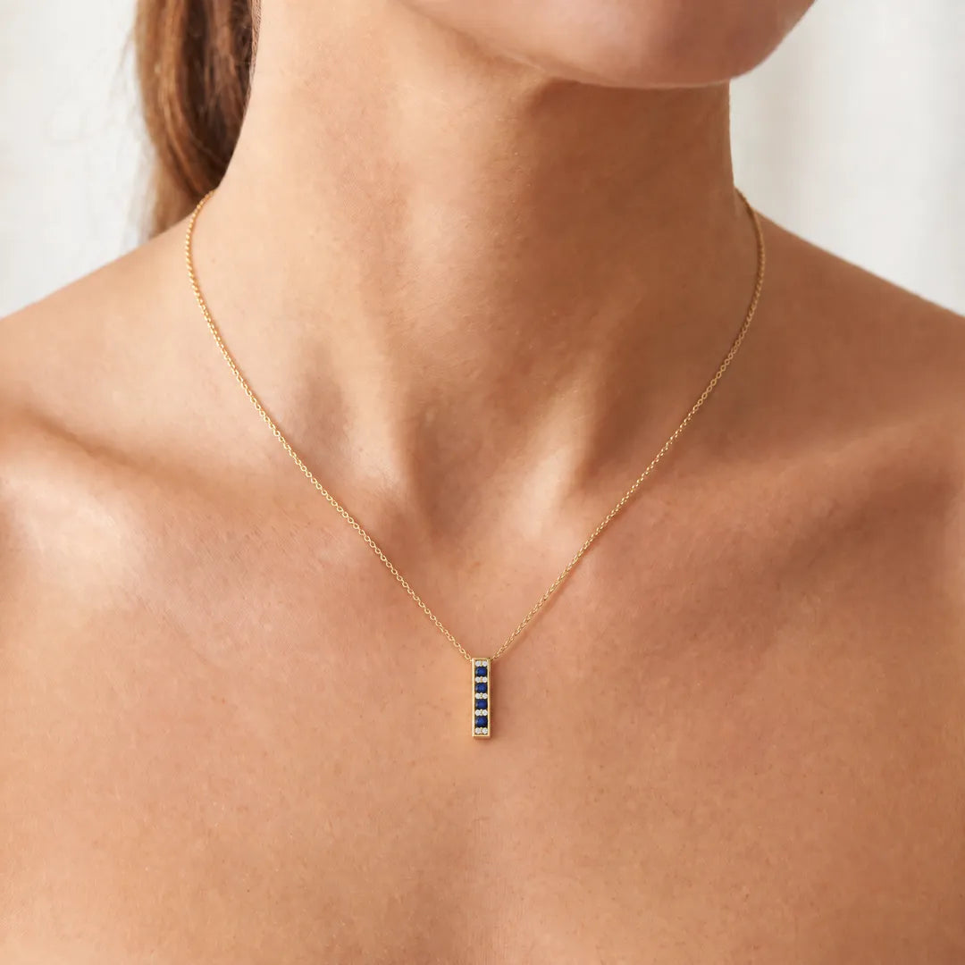 Diamond Sapphire Pendant with 0.10ct Diamonds in 9K Yellow Gold, bar pendant worn on a fine gold chain on model