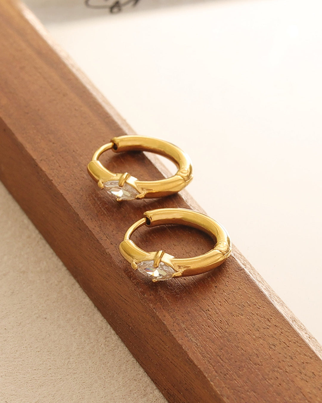 Aurora Gold Marquise Cubic Zirconia Huggie Earrings