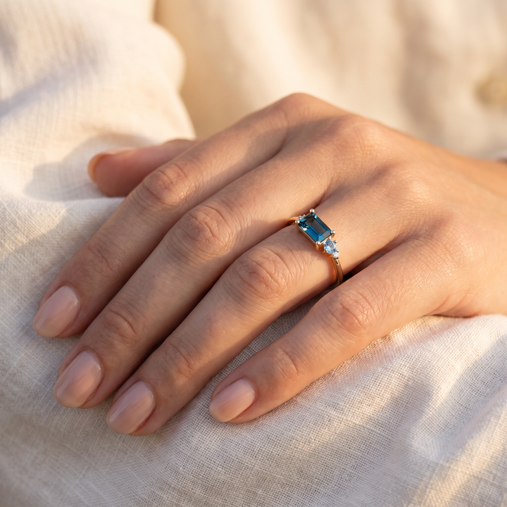 Diamond, London Blue Topaz, Blue Topaz Ring with 0.02ct Diamond in 9K Yellow Gold worn on hand - lifestyle shot
