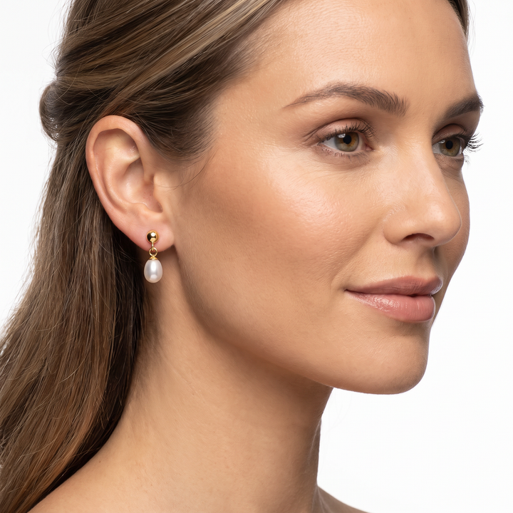 9K Yellow Gold Pearl Drop Earrings 5mm worn on model