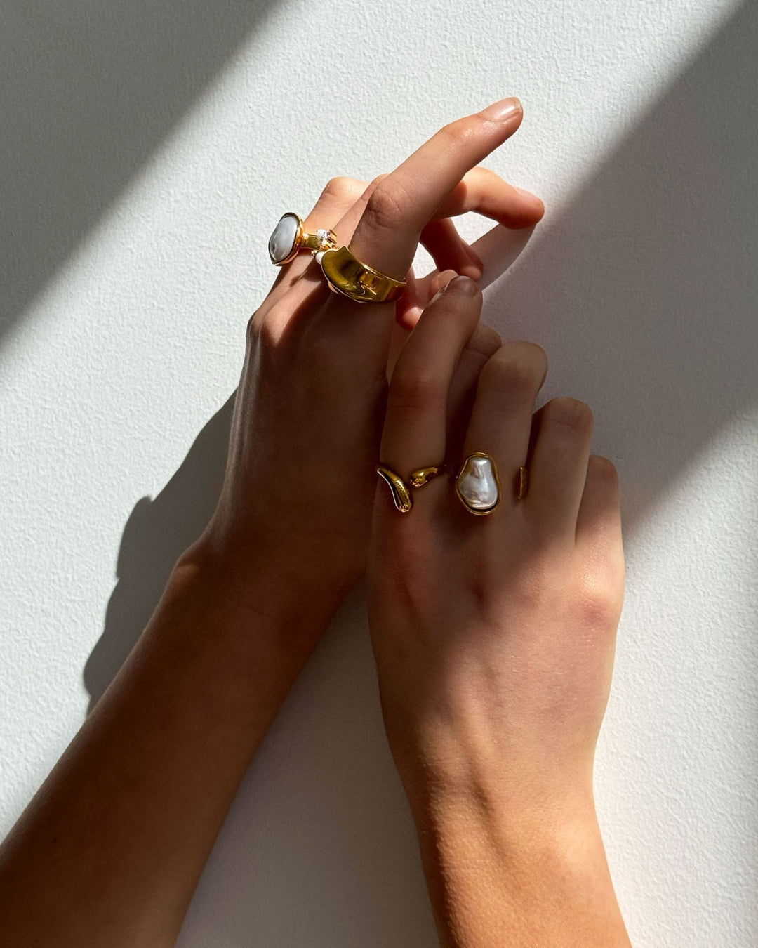Luna Polished Flat Pearl Ring styled in a ring stack — Zoe Olivia
